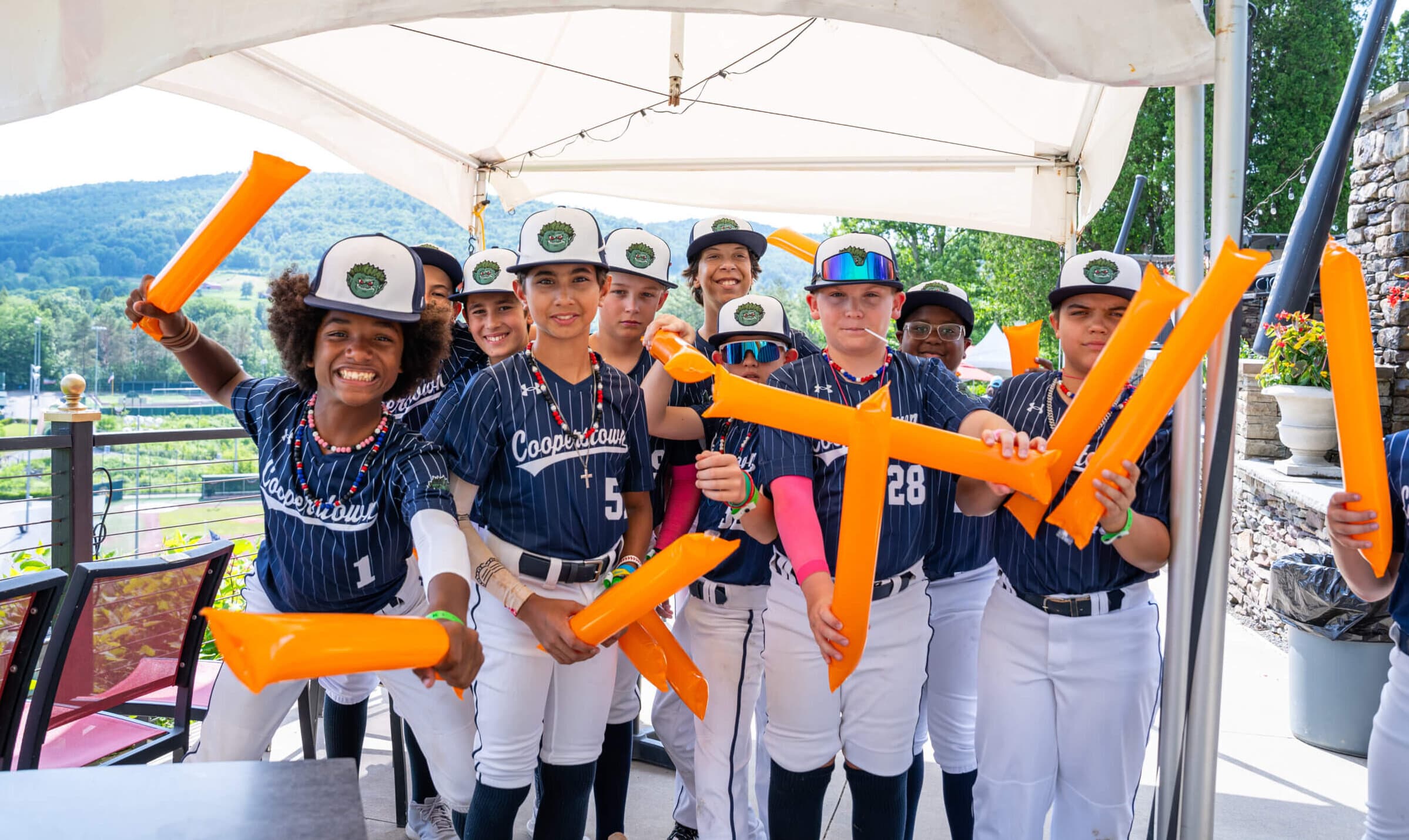 Cooperstown All-Star Village tournament team celebrating